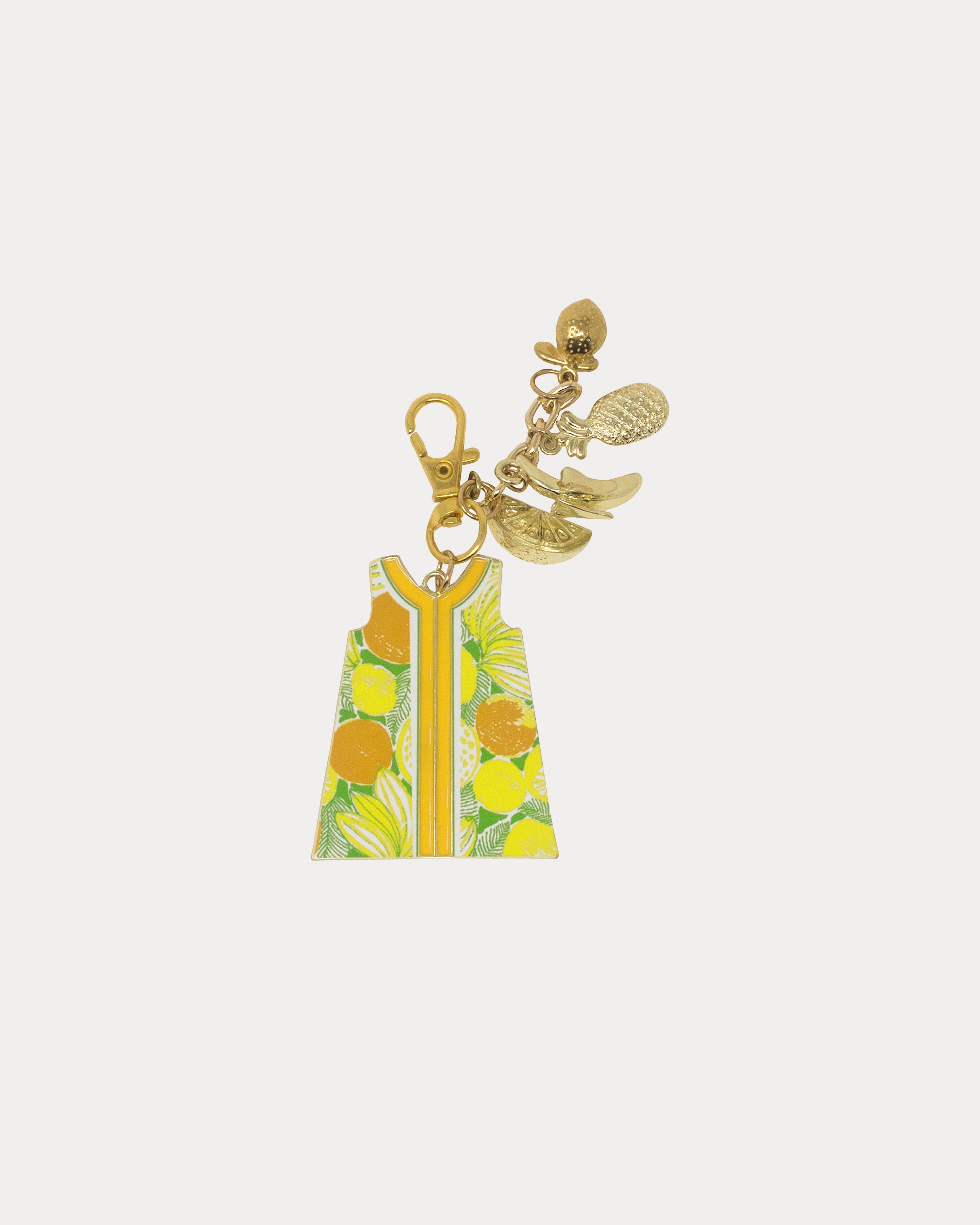 Lilly Pulitzer keychain with a dress charm featuring lemon design Color: Island Palm Zesty