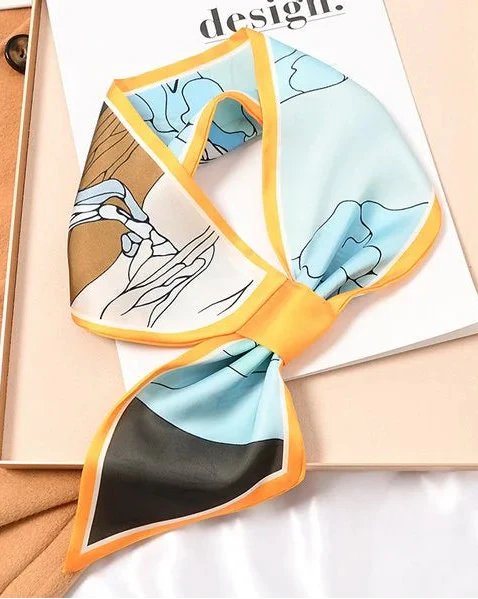 WINDING RIVER equestrian desert loop scarf featuring a stylish, lightweight fabric with desert-inspired patterns and vibrant colors.