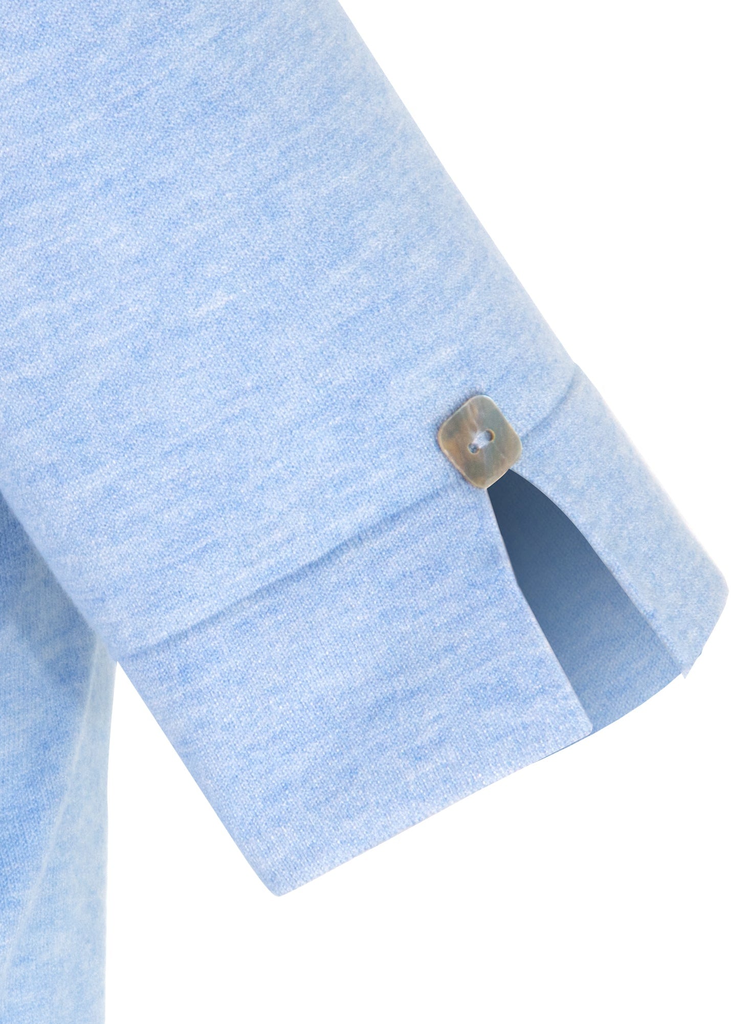 Close-up of a light blue shirt with a button on a white background