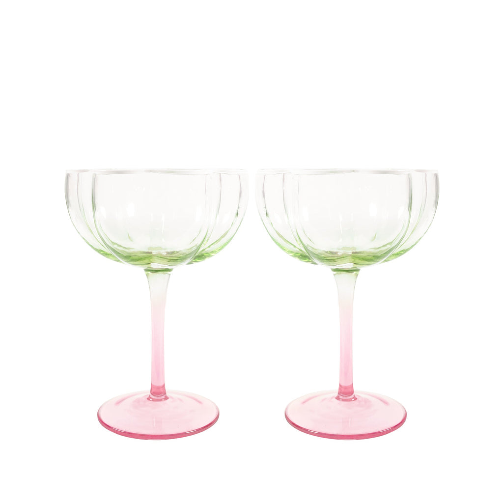 Lifeguard Press coupe glass set in jade pink with elegant, curved design for stylish serving of beverages.