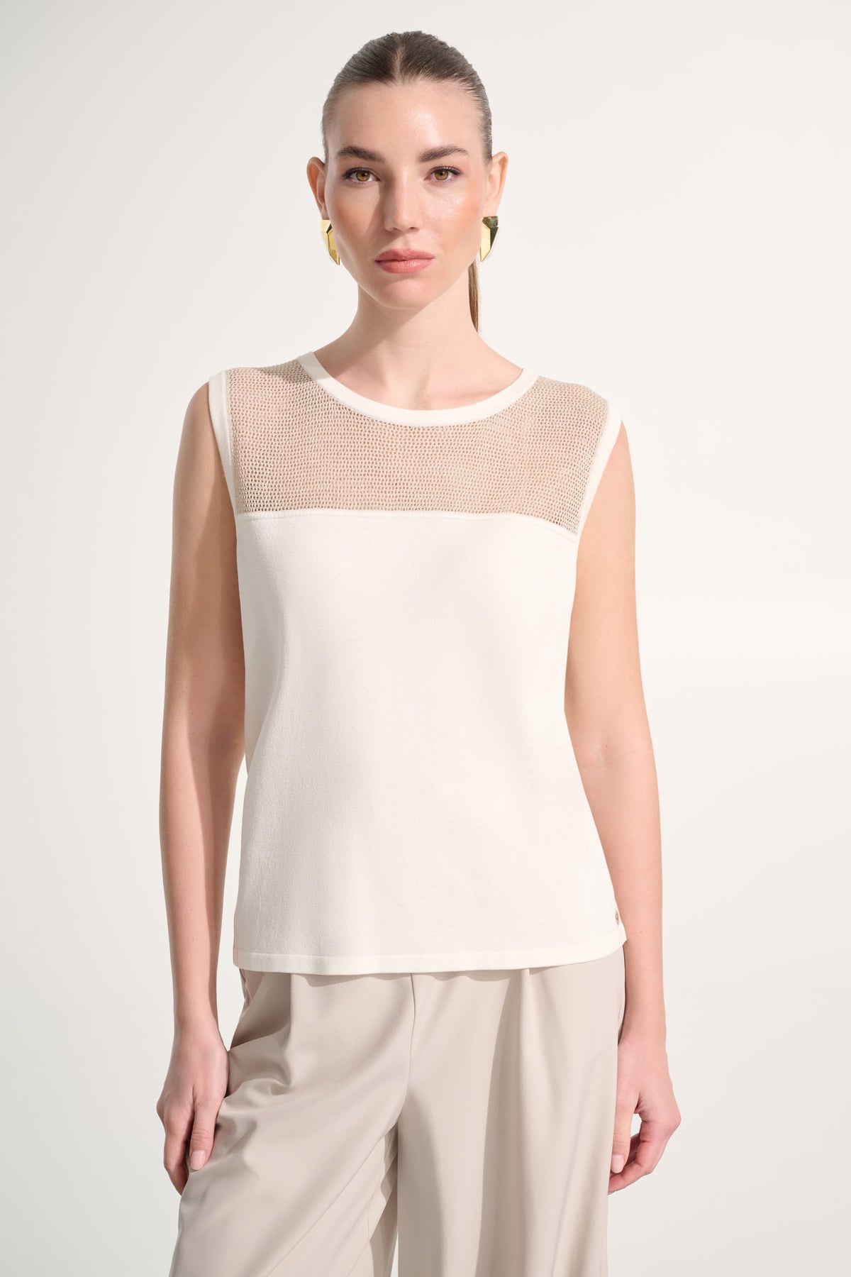 Joseph Ribkoff sleeveless crew neck pullover top in a stylish, fitted design with a smooth fabric finish.