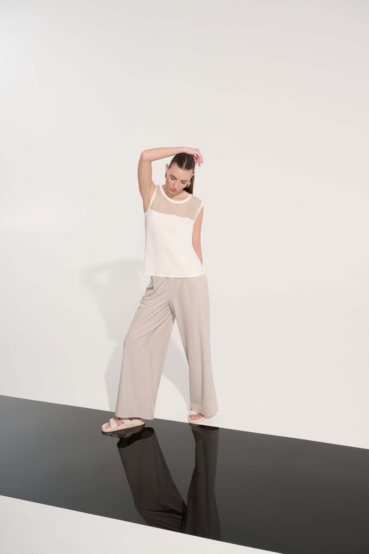 Sleeveless crew neck pullover top by Joseph Ribkoff in a neutral color, displayed on a mannequin.