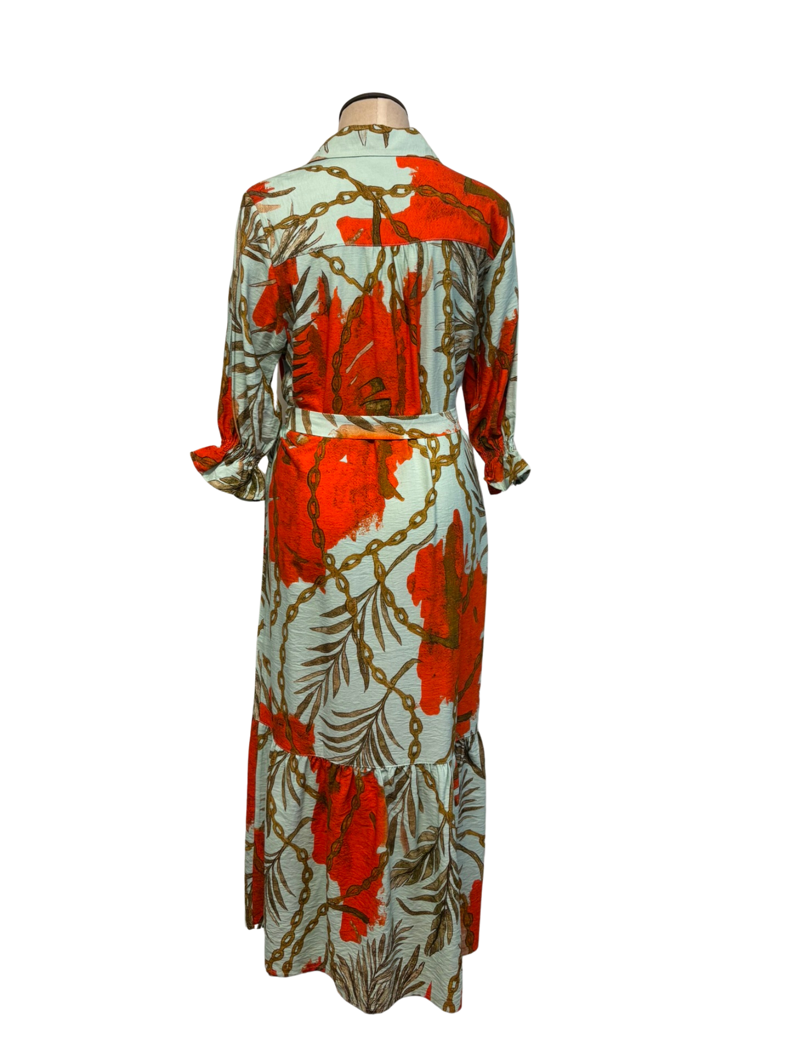 Long-sleeve dress with a floral pattern on a white background
