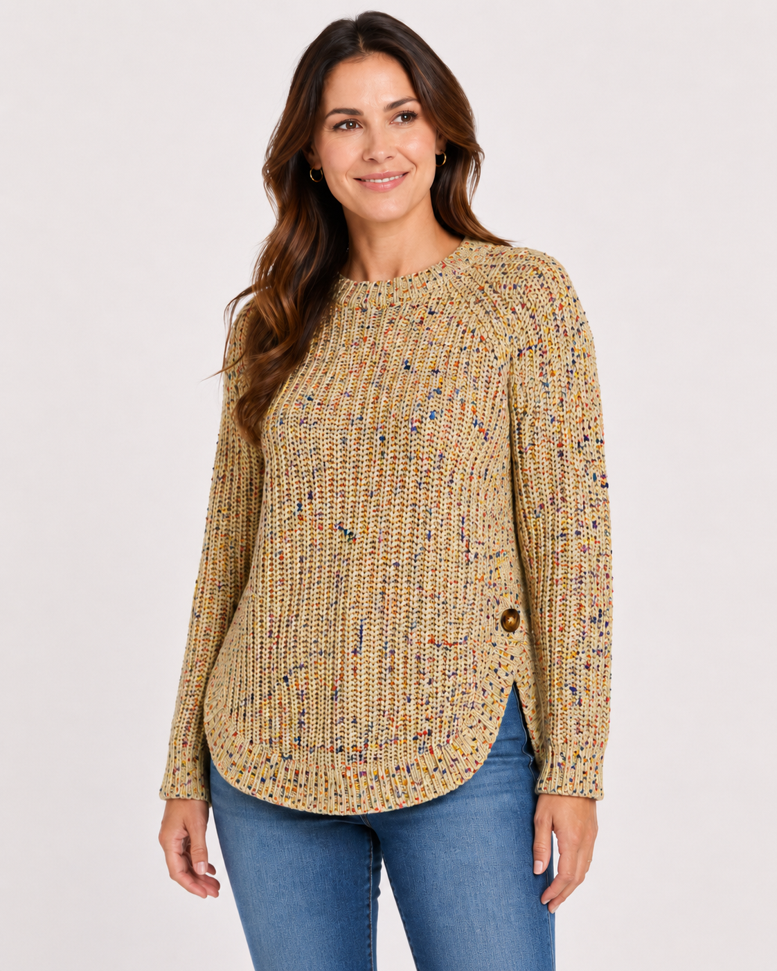 A woman wearing a textured, long-sleeve knit sweater in a beige and yellow heathered pattern with small multicolor flecks, Confetti Side Button Sweater