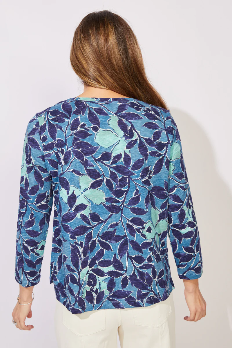 Woman wearing a blue floral patterned top ESCAPE BY HABITAT FOLIAGE FLORAL COTTON BOXY TEE - 12125 Color Harbor