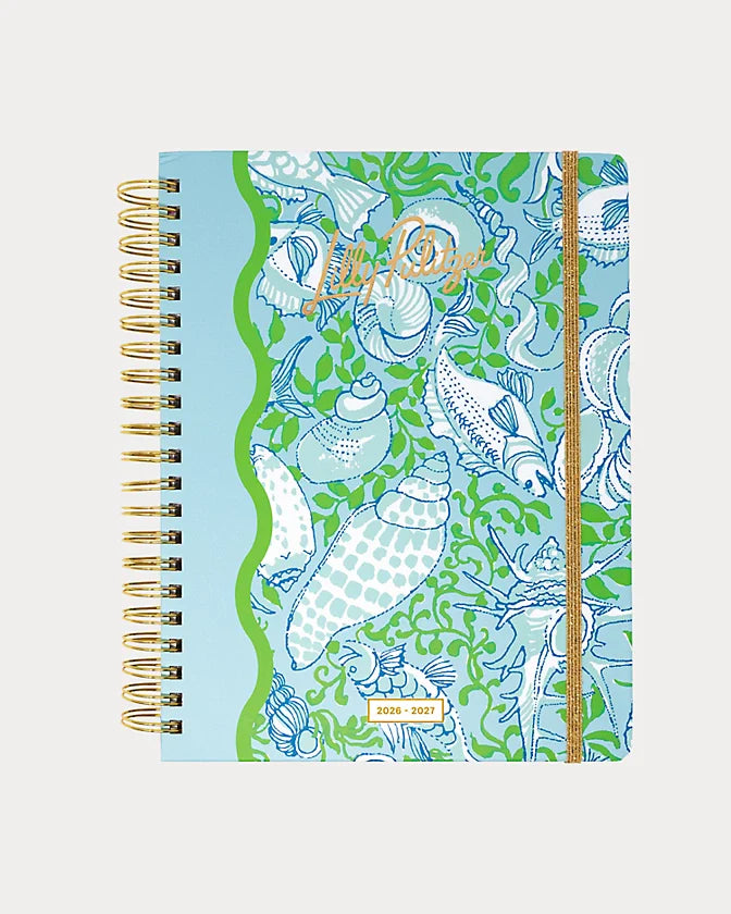 Lilly Pulitzer 2026-2027 17 Month Jumbo Agenda Spiral-bound planner with a decorative cover featuring sea shells and fish in the Color Day Dream Blue Throw Me A Line