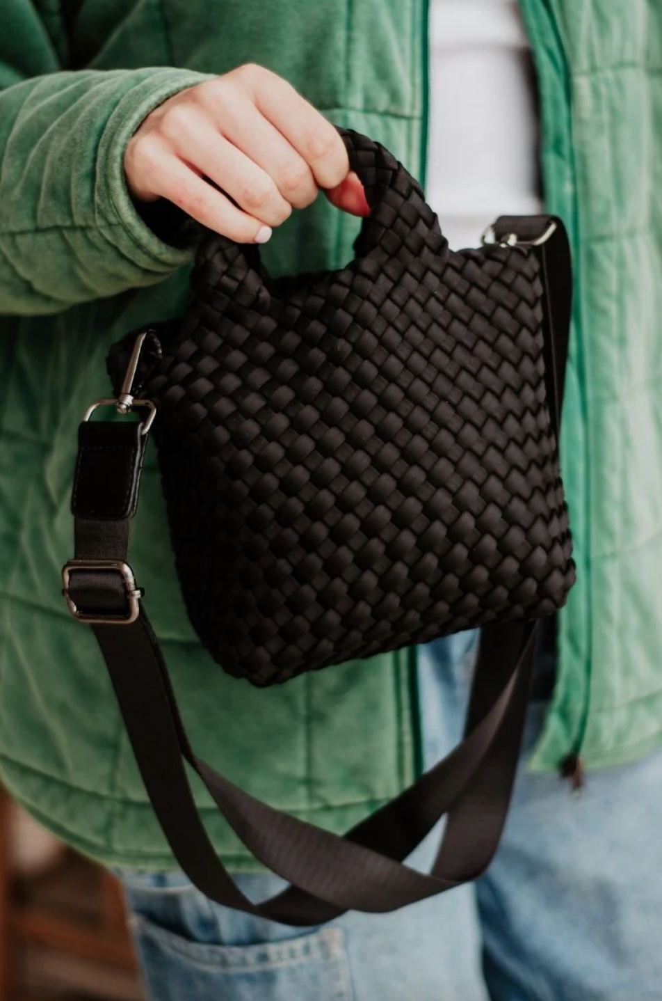 KATYDID neoprene braided clutch handbag with a sleek, modern design and textured braided detail for stylish occasions.