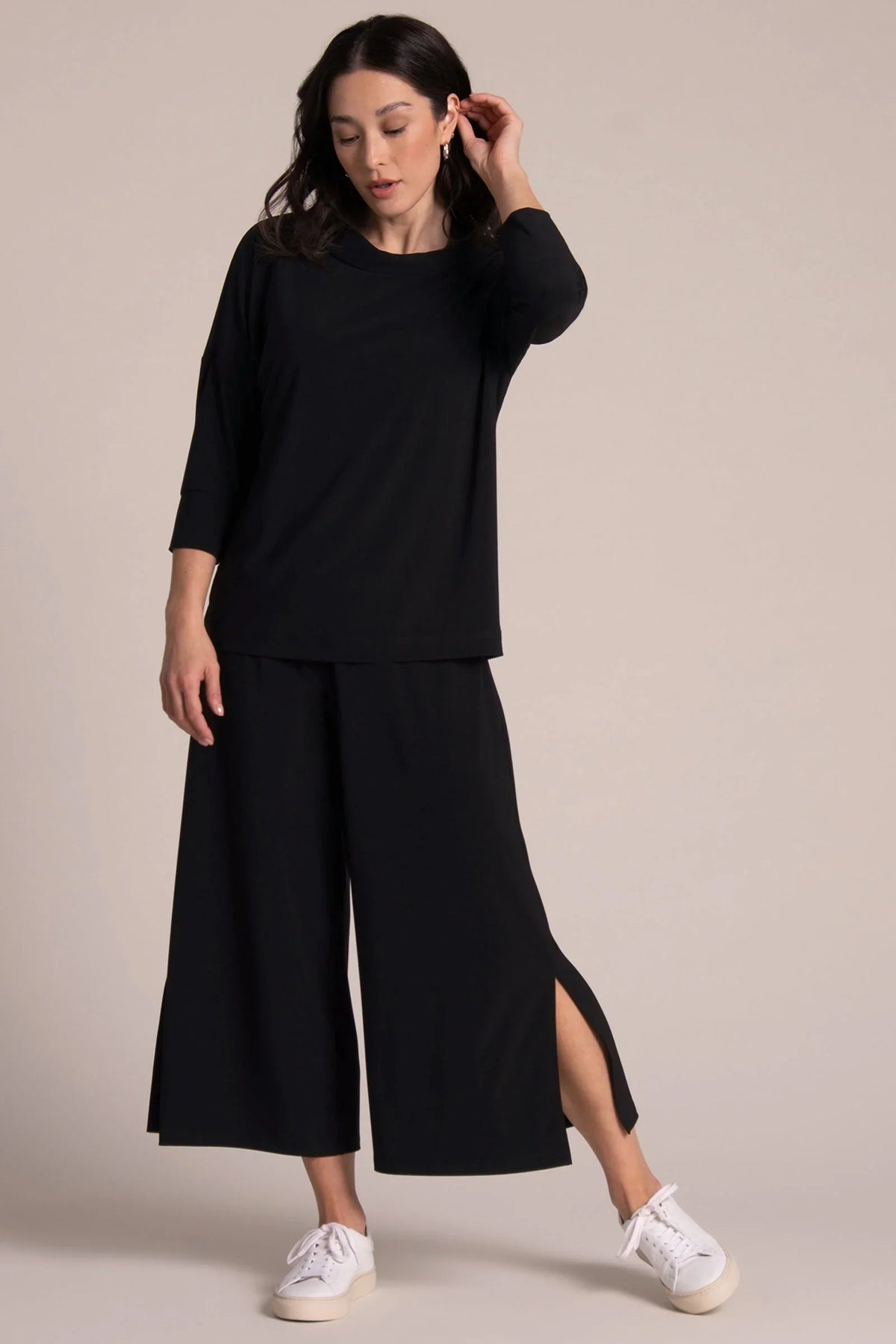 Black SYMPLI slouch sweatshirt, a cozy and stylish casual top with a relaxed fit and soft fabric in the image.