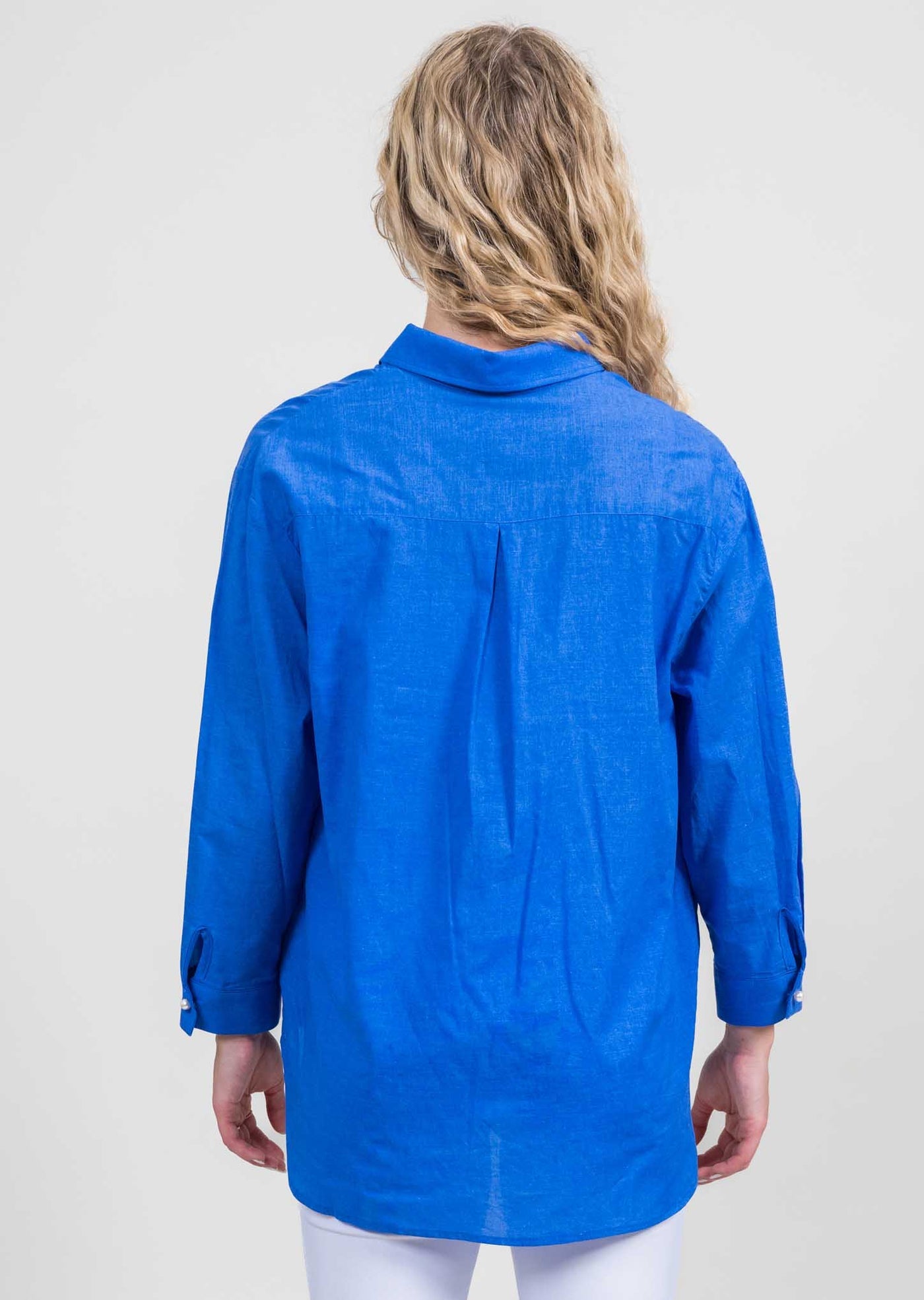 Trisha Tyler | Solid Blue Top