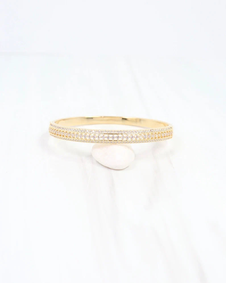 Gold bracelet with lined in cz