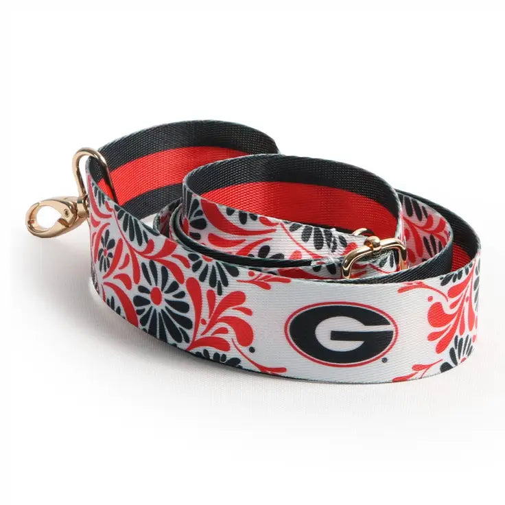 UGA Georgia Bulldogs Floral Purse Strap clear crossbody bag with a red, black, and white patterned strap.