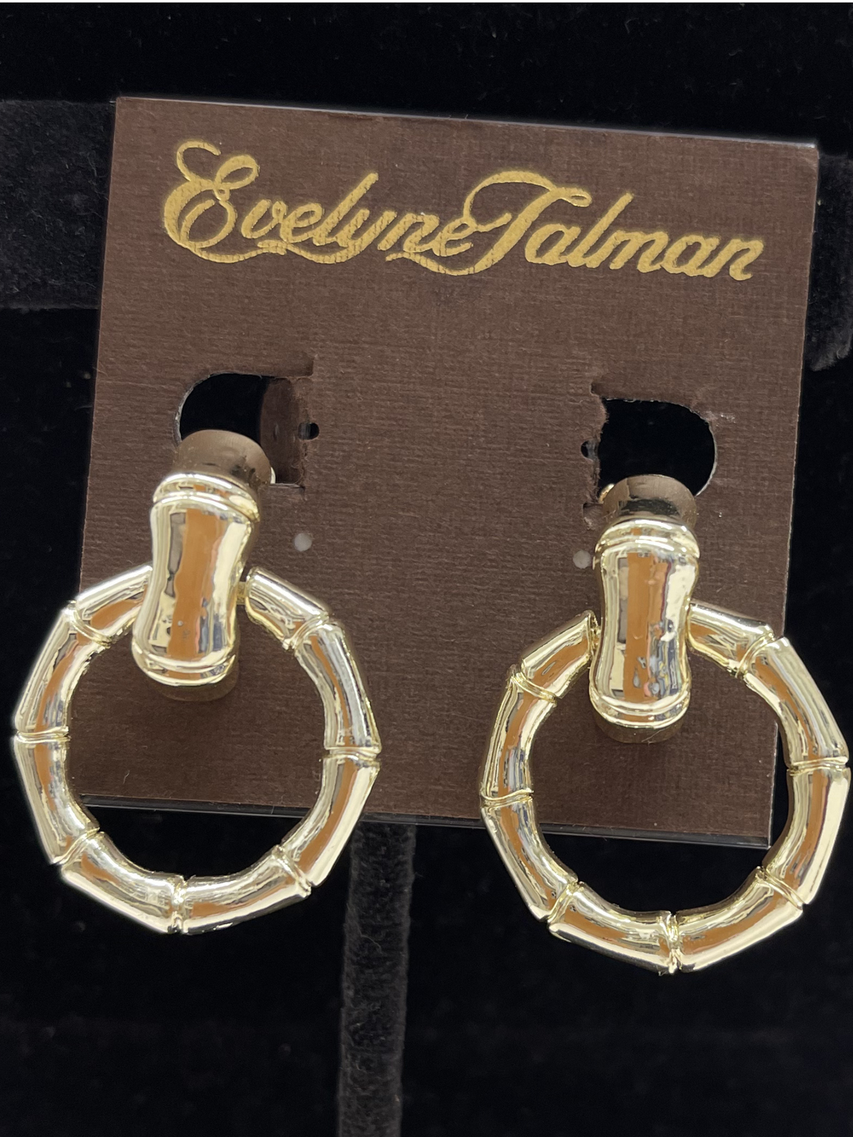 Gold bamboo doorknocker clip-on earrings by LORDANE, INC. featuring a sleek, natural bamboo design and secure clip-on style.