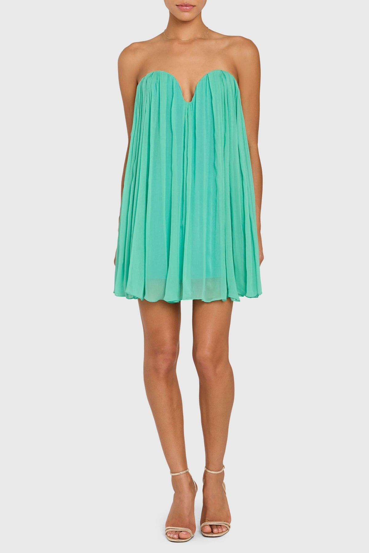 Amanda Uprichard Briella Dress in Caribbean, vibrant sleeveless dress with flowing fabric and floral pattern, perfect for summer.