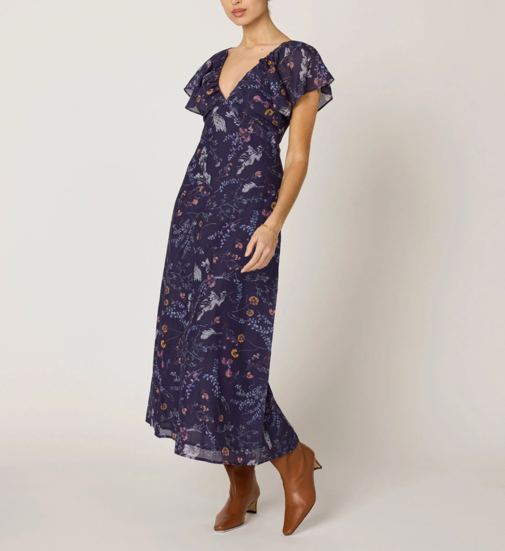 woman wearing dark blue dress