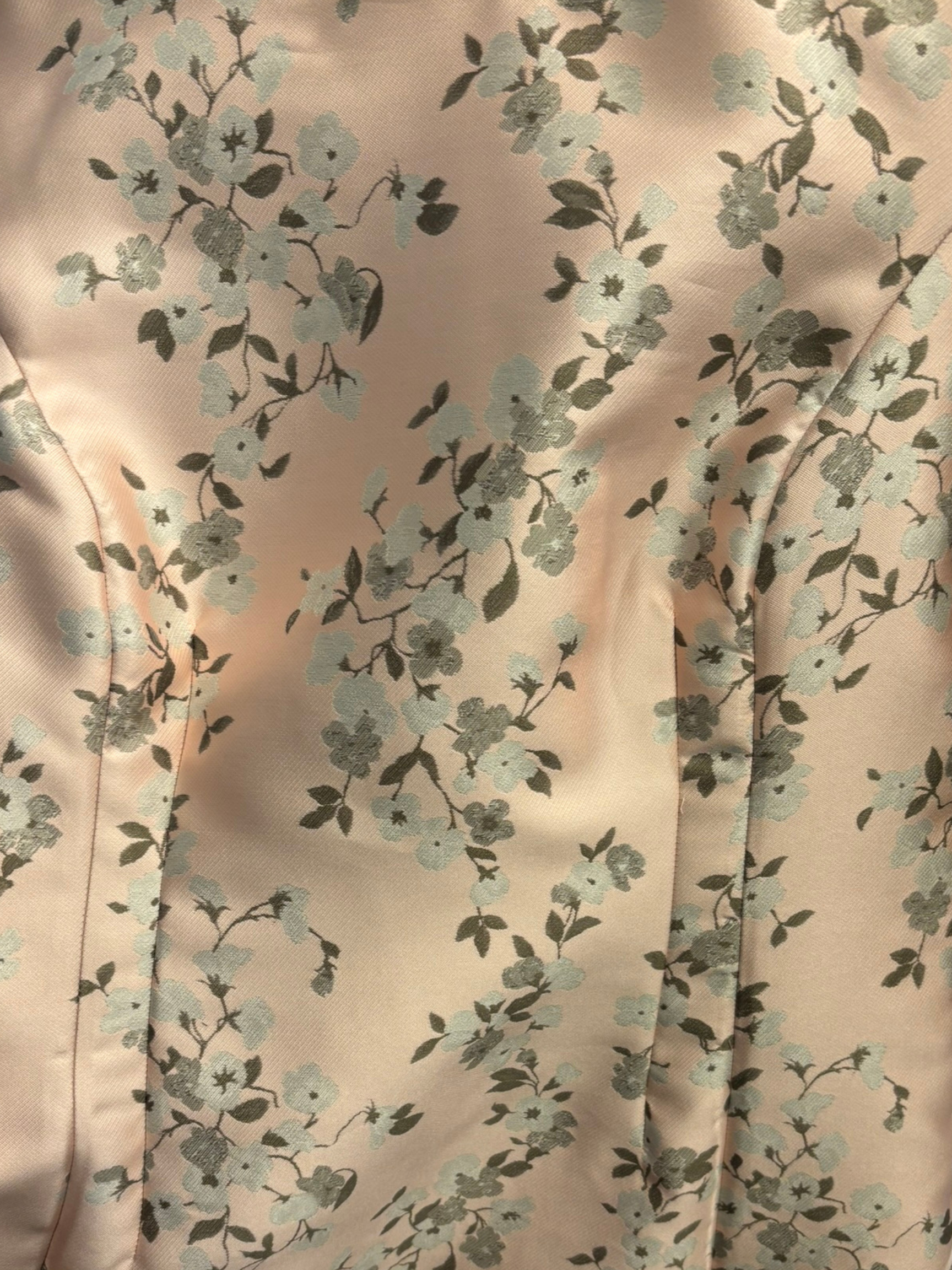 Floral pattern on a fabric with a soft pink background