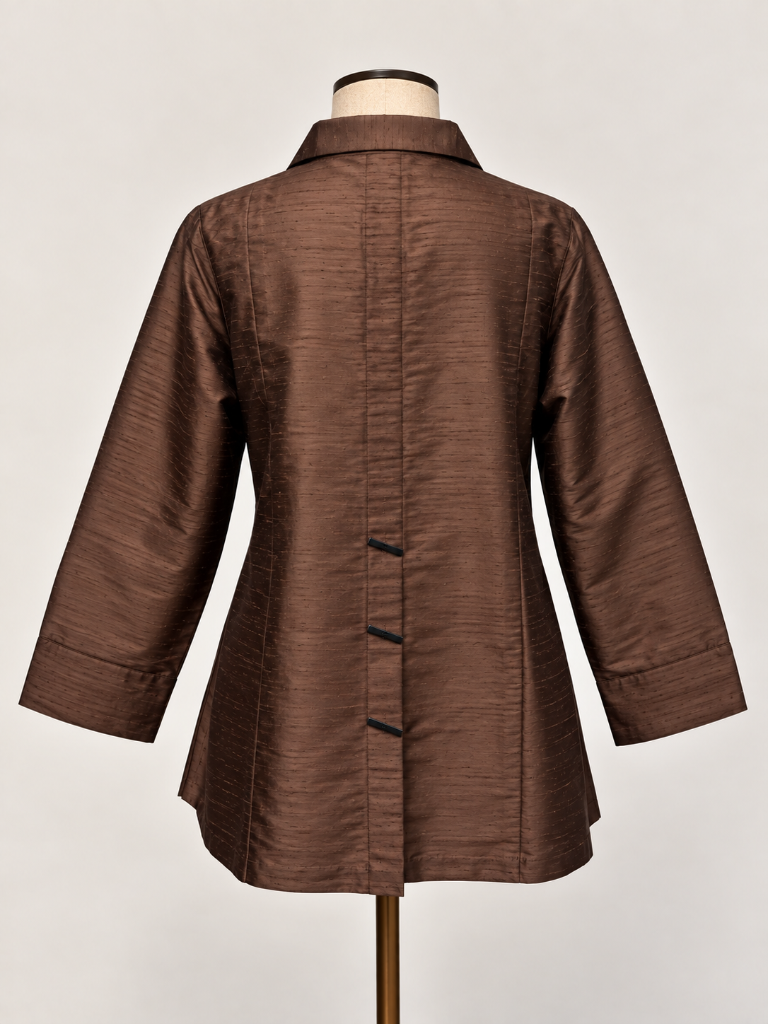 A silk brown textured long-sleeve button-up shirt jacket