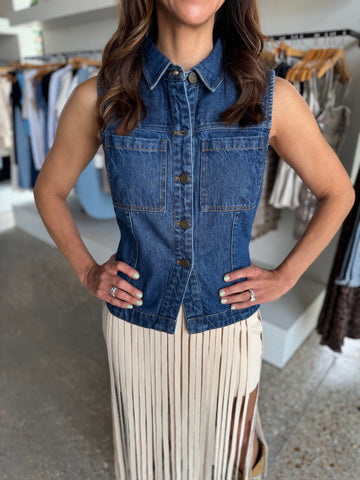 Dark denim Franka vest by CLEOBELLA displayed on a hanger, featuring a classic sleeveless design with a button front.