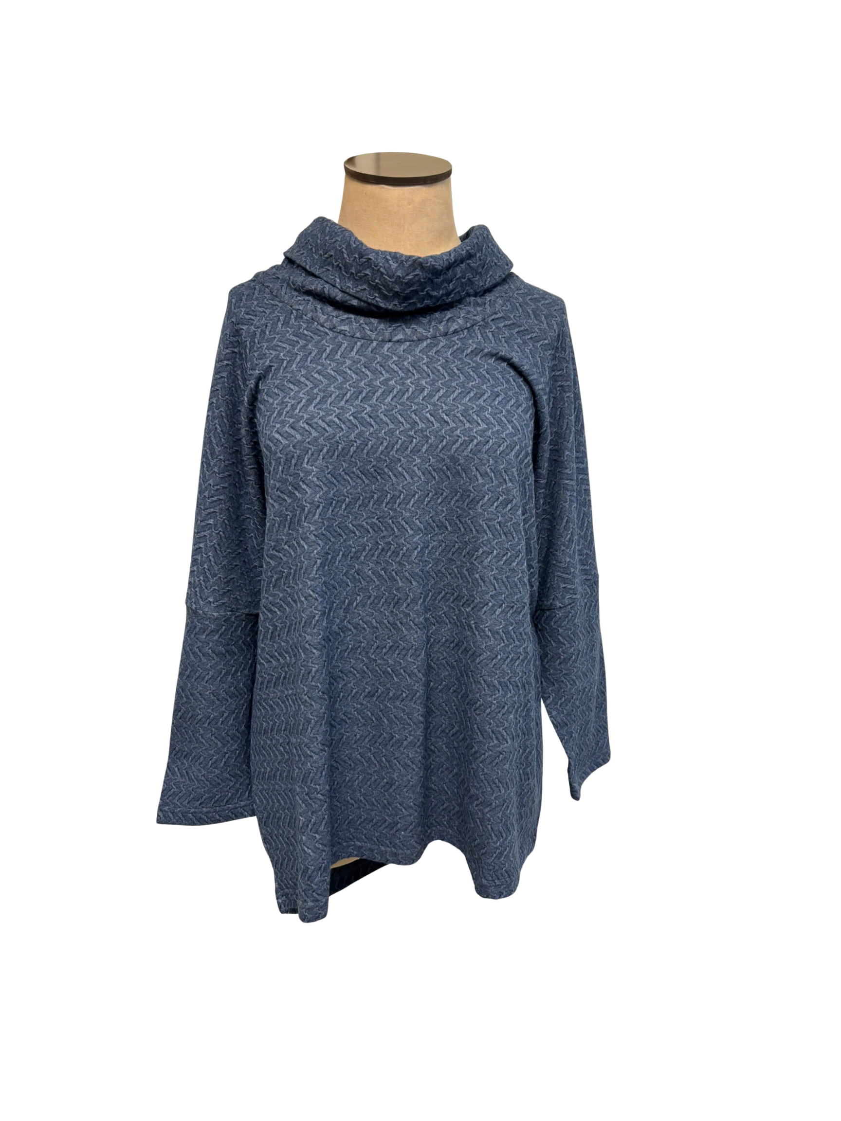 Blue blouse on a mannequin against a white background