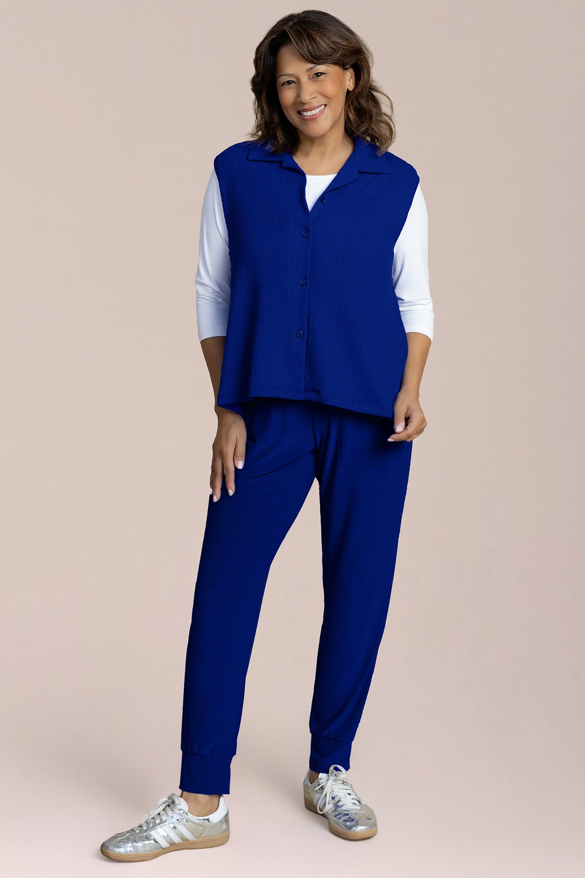 Sympli Pop Mykonos vest in lapis blue, stylish sleeveless design with a smooth fabric finish.
