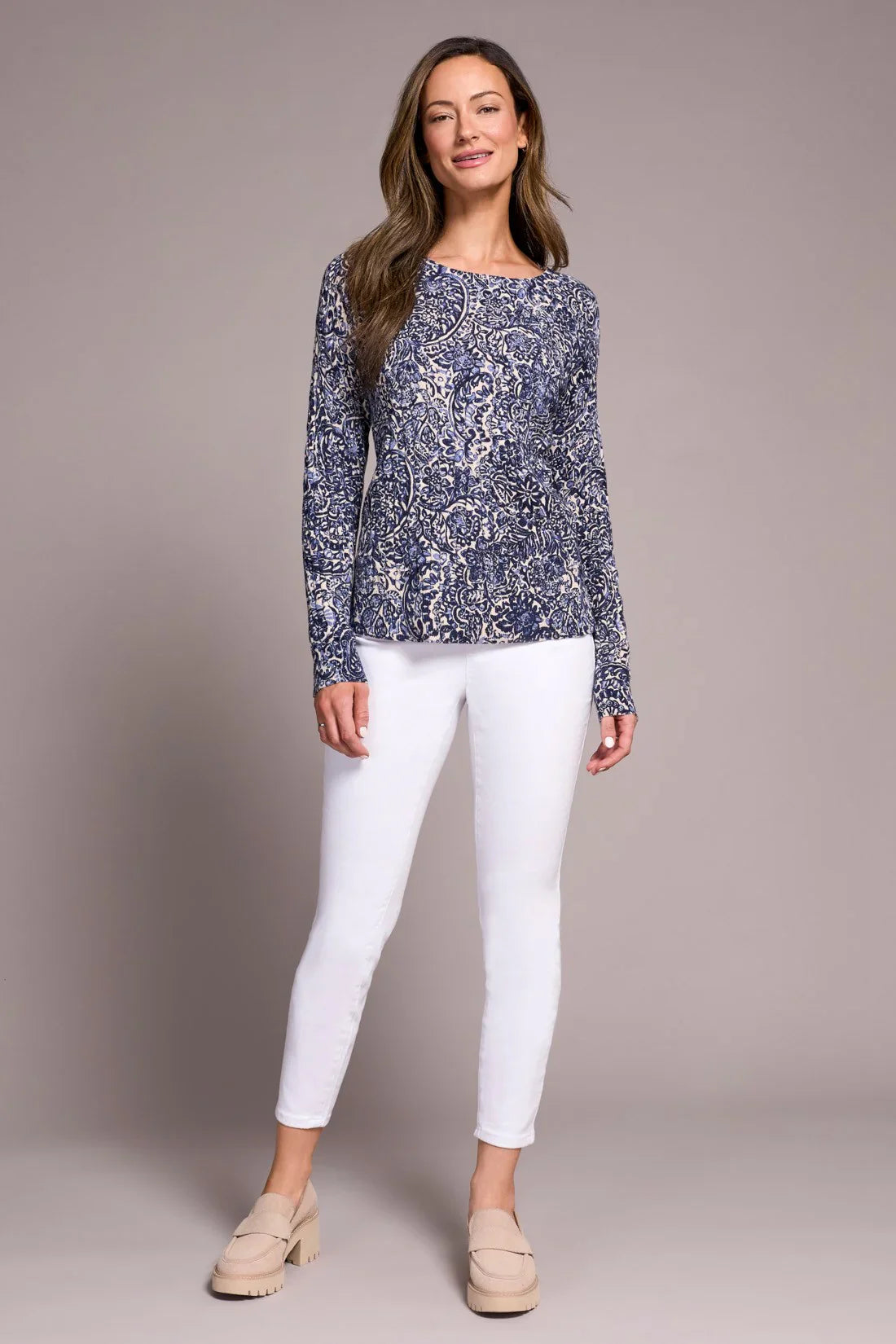 Tribal printed cable cotton crew neck sweater in sapphire with intricate knit pattern and ribbed collar, displayed on a neutral background.