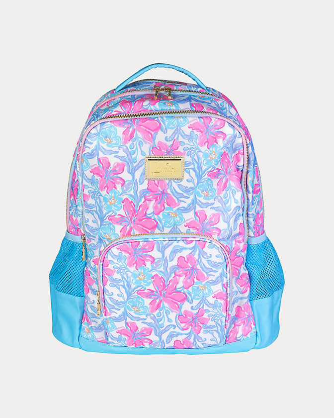 Lifeguard Press Beachside Haven backpack with colorful tropical print and adjustable shoulder straps on a neutral background.