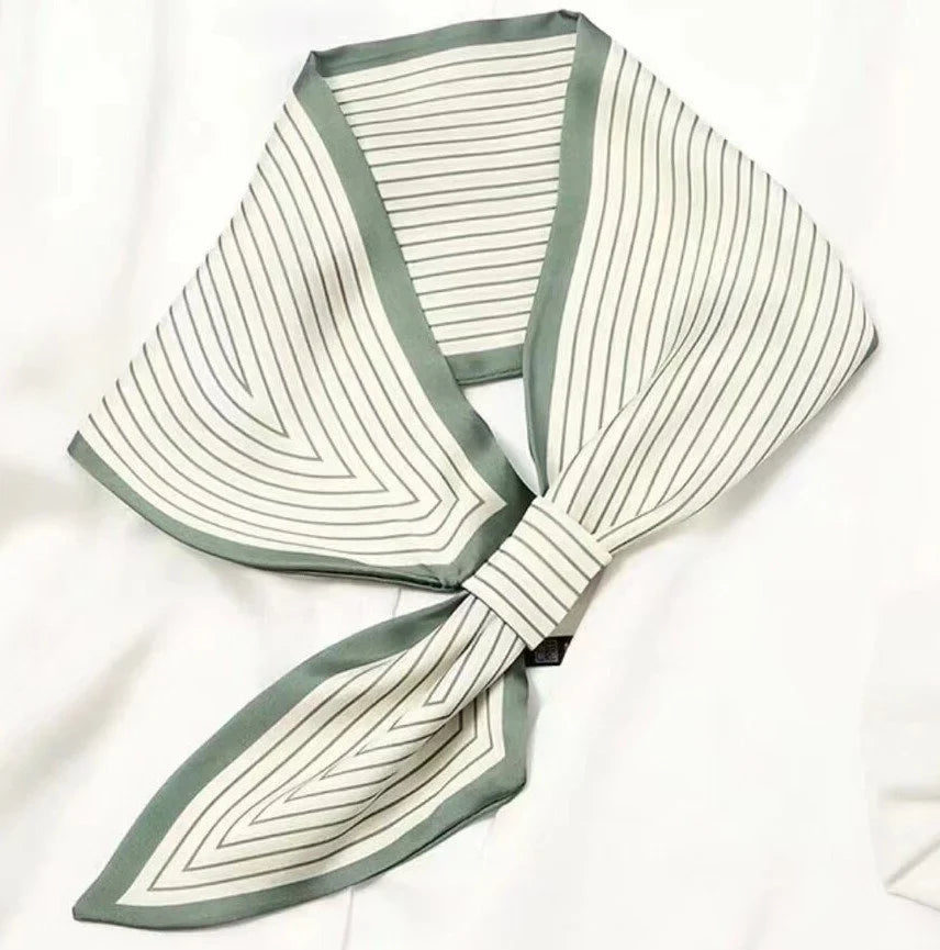 WINDING RIVER Stripes Loop Scarf in gray and white with a stylish looped design, perfect for adding a touch of elegance to any outfit.