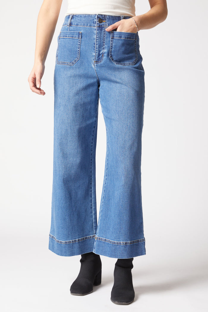 Light blue stretch denim wide leg ankle jeans by HABITAT, showing the relaxed fit and stylish design on a model.