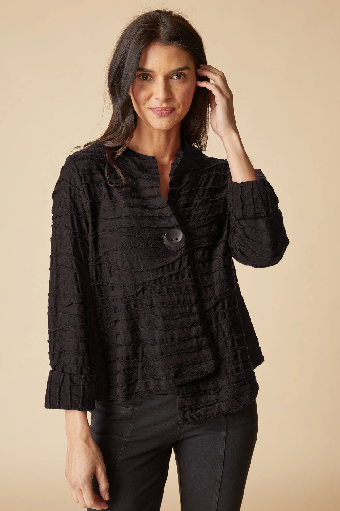Black City Wave Skylight Jacket by HABITAT, MISSYSPORTSWEAR line, shown on a hanger with front view and zip closure.