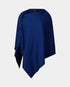 Blue poncho with button details on a light gray background