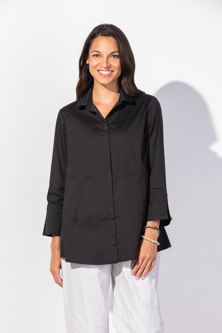 Black Habitat Perfect Travel Sld Hidden Placket Shirt, a sleek tops with concealed button placket and tailored fit.