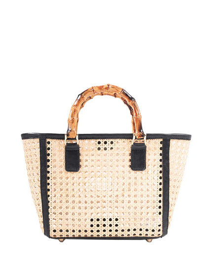 Woven handbag with black accents on a white background