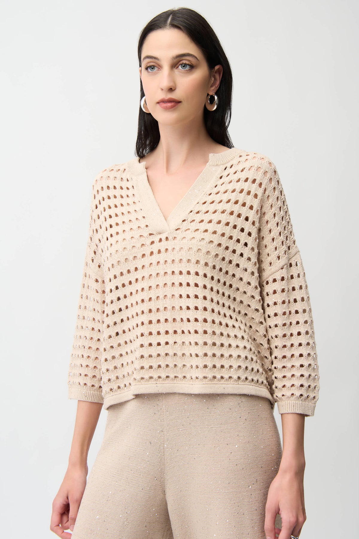 Joseph Ribkoff boxy sweater in soft knit fabric, featuring a relaxed fit and long sleeves, shown on a mannequin.