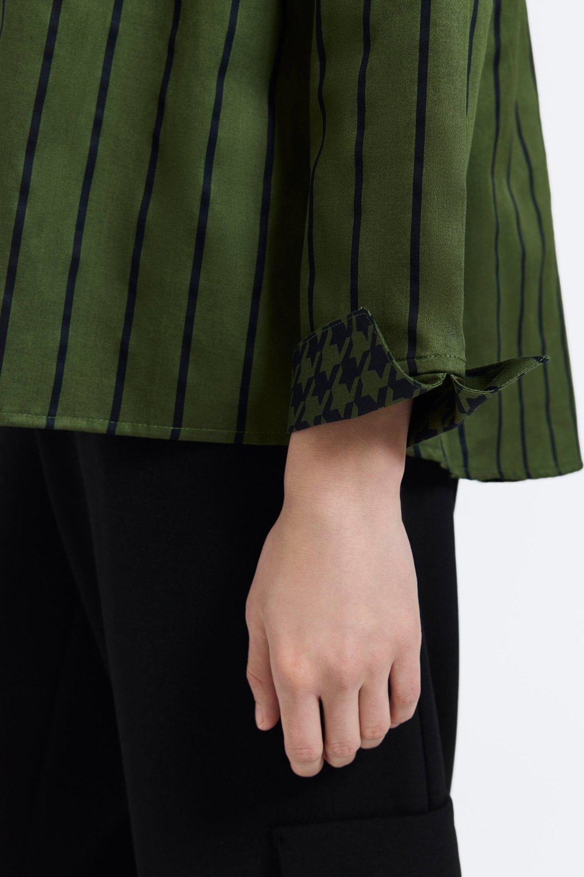 FOXCROFT Agnes Top in green with a striped pattern, casual short-sleeve blouse for women, displayed on a plain background.