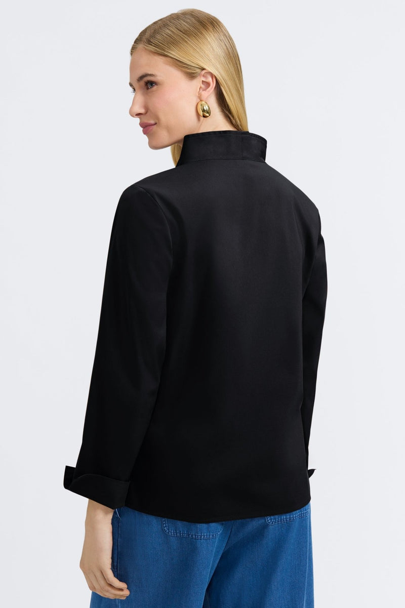 Black FOXCROFT Tammy long sleeve pullover top, shown flat with soft stretch fabric and ribbed cuffs.