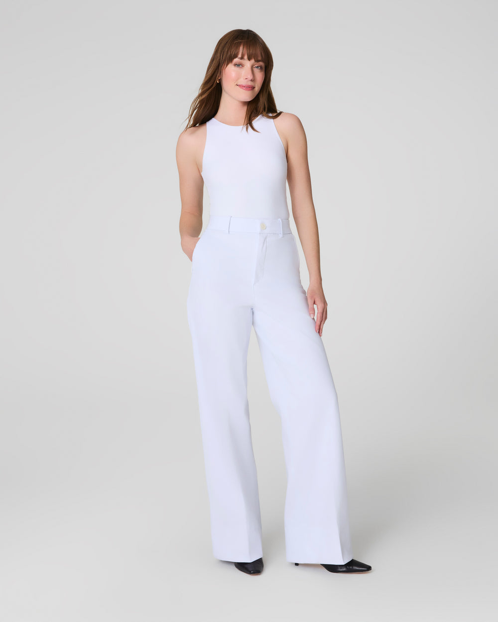 White Stretch Twill Wide Leg Pants by SPANX, showing the relaxed fit and stylish design on a model.