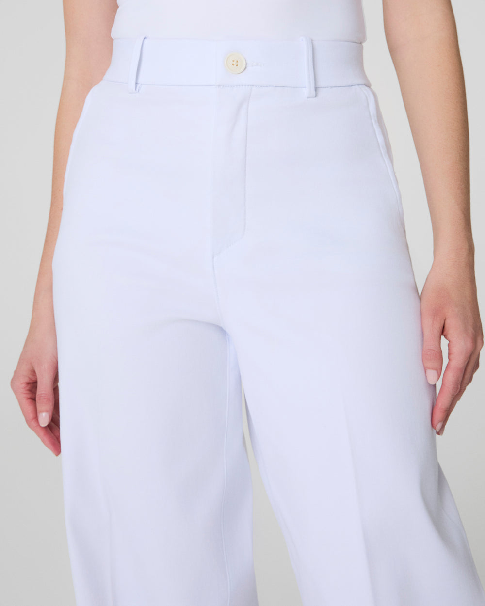 White Stretch Twill Wide Leg Pants by SPANX, showing a relaxed fit with a high waist and wide leg design.