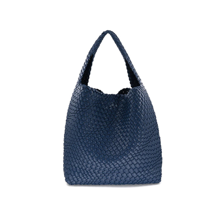 Navy BC HANDBAGS handbag with sleek design, featuring a structured shape and elegant handles on a neutral background.