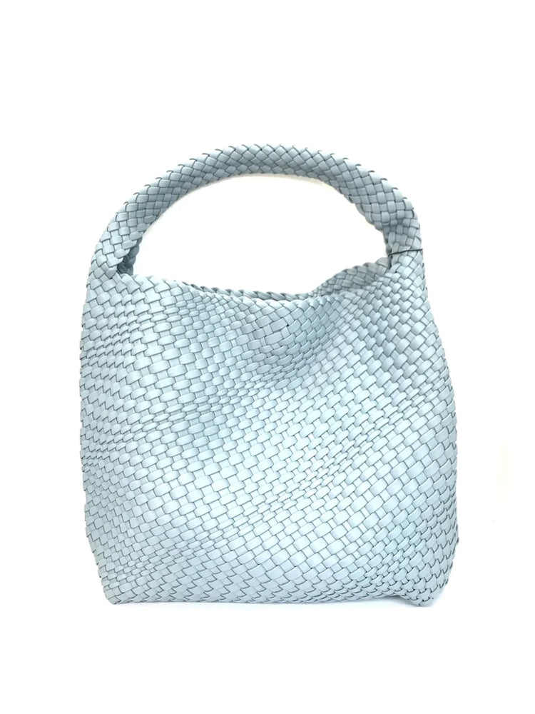 Sky blue BC HANDBAGS handbag with sleek design, featuring a structured shape and elegant handles.