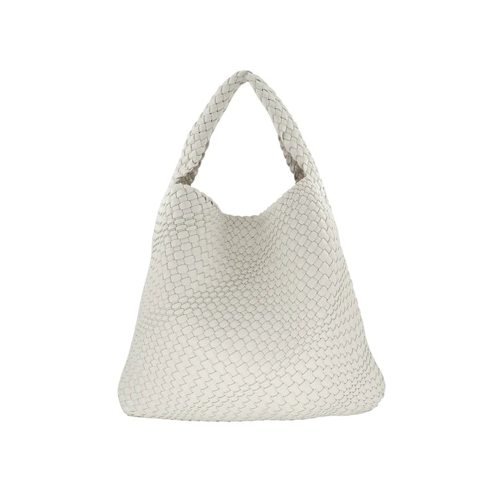 White BC HANDBAGS handbag with sleek design and gold-tone hardware, featuring a top handle and spacious interior.
