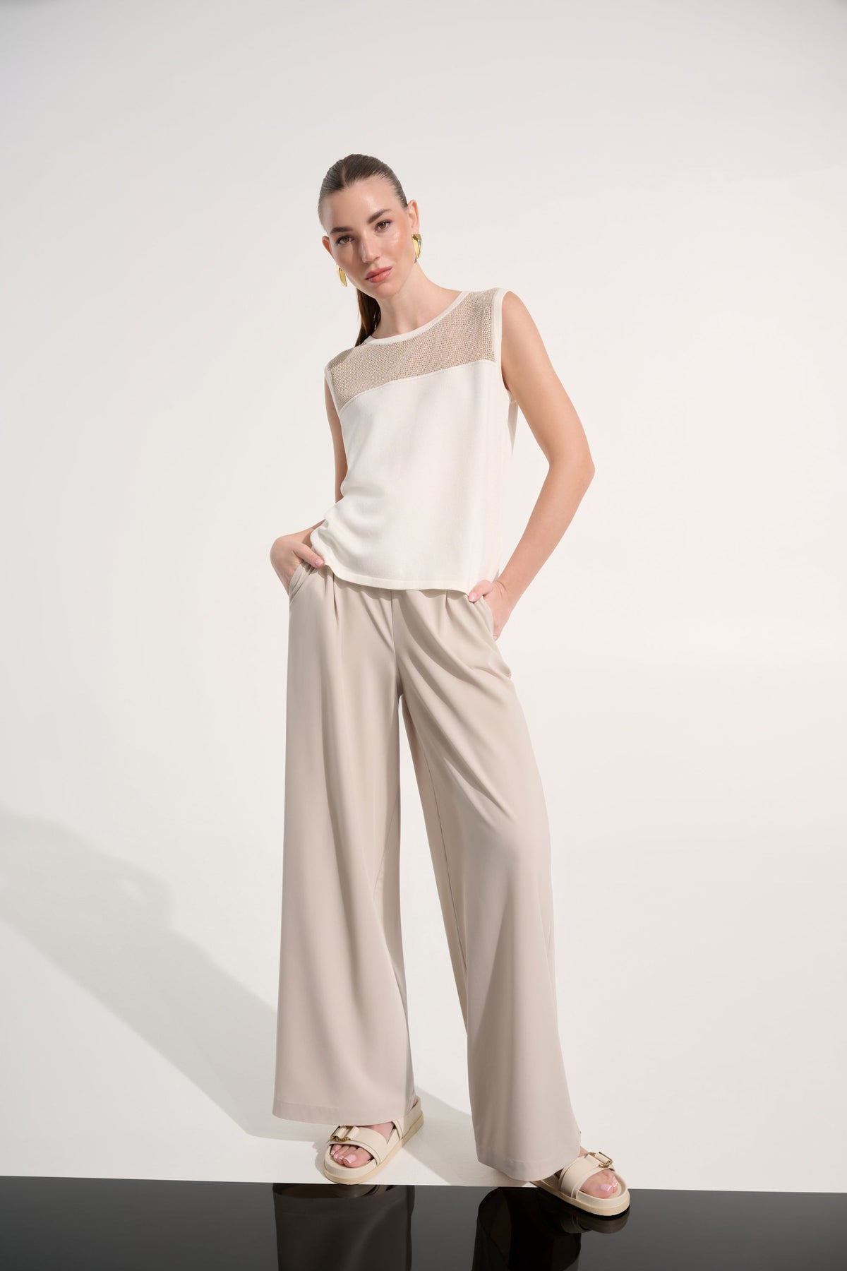 Joseph Ribkoff sleeveless crew neck pullover top in a solid color, displayed flat on a white background.