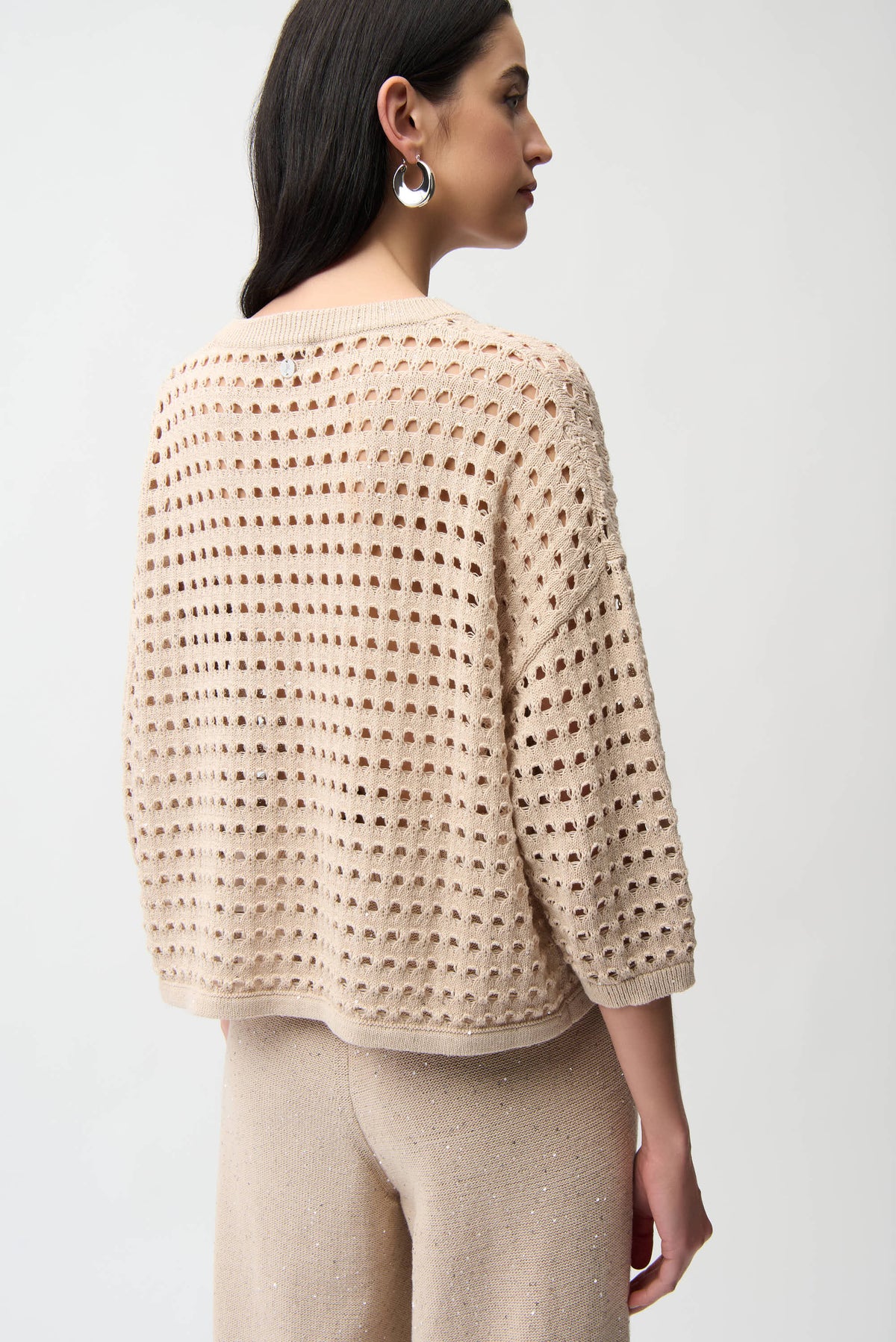 Joseph Ribkoff boxy sweater featuring a relaxed fit, soft fabric, and stylish design in a versatile, modern silhouette.