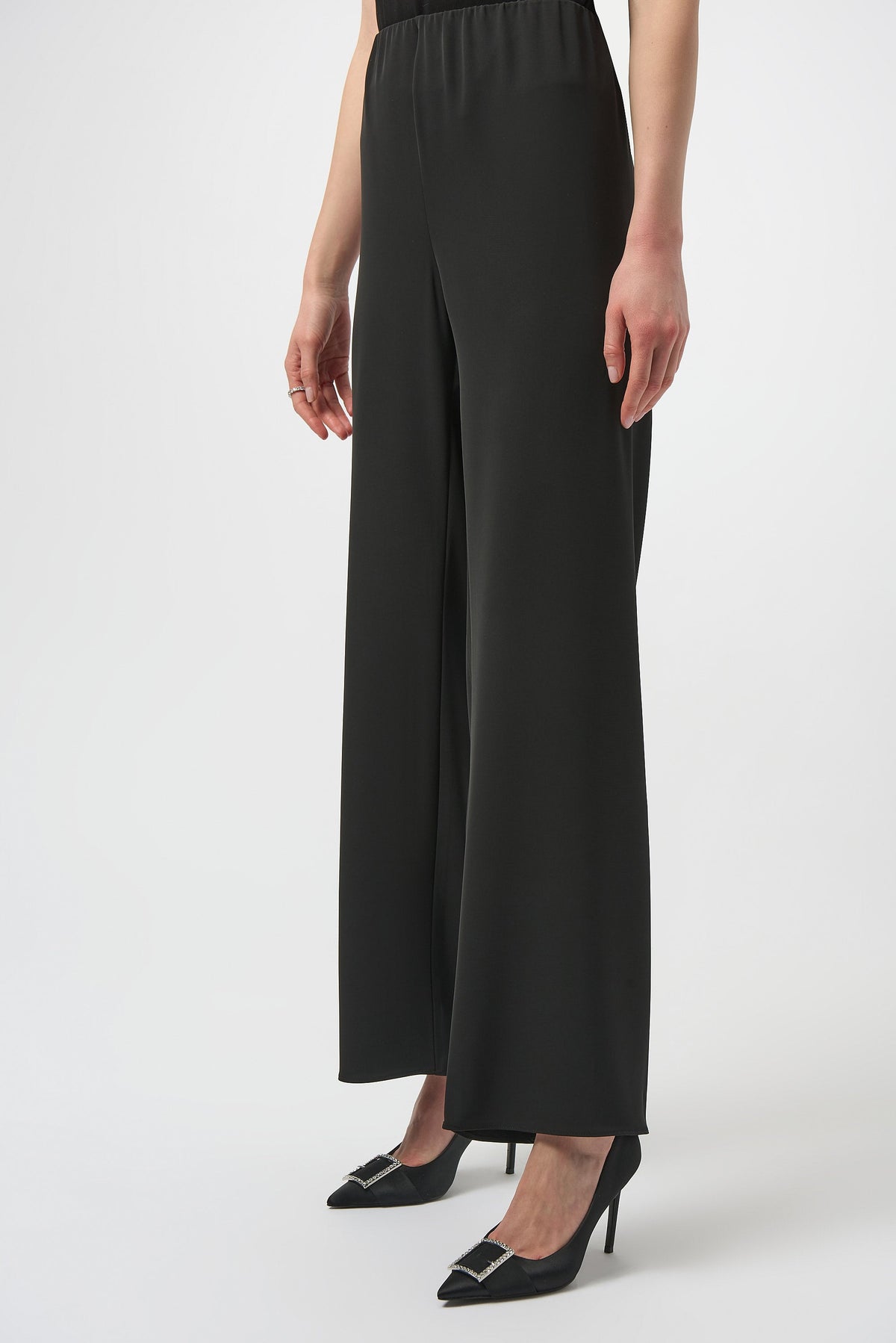 Black wide-leg pull-on pants by Joseph Ribkoff, featuring a comfortable high-waist design and flowing silhouette.
