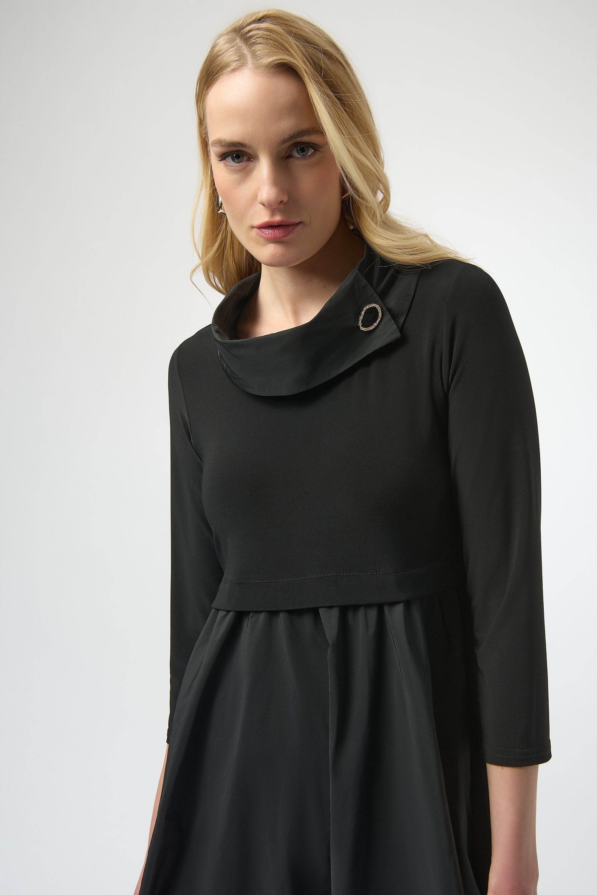 Joseph Ribkoff knit and taffeta dress featuring a stylish design with a fitted bodice and elegant fabric details.