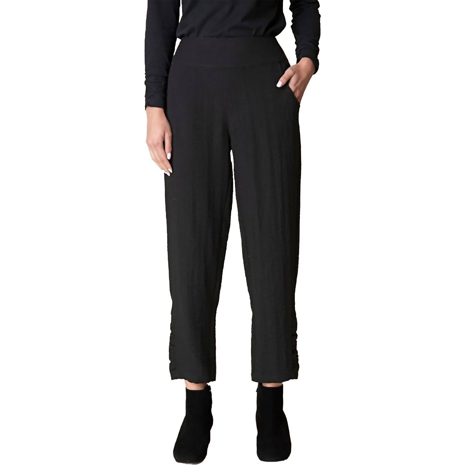 Habitat solid ruched ankle pants with a fitted design and side pockets, shown in a neutral color on a model.