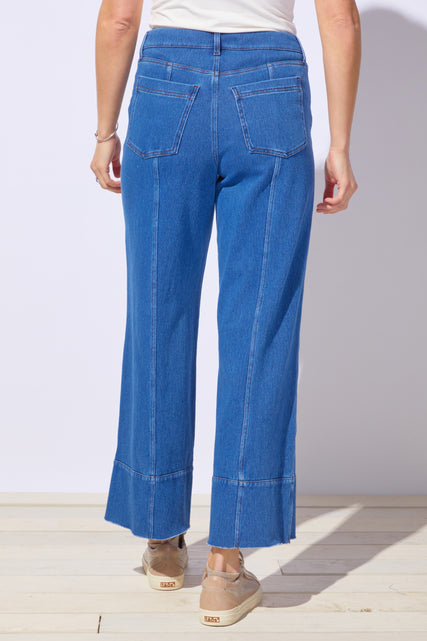 Mid-wash relaxed fit denim pants by Escape by Habitat, showing the comfortable leg design and classic jean style.