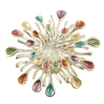 Sunburst Magnetic Brooch by ORIGIN JEWELRY featuring a vibrant sunburst design with magnetic clasp for secure wear.