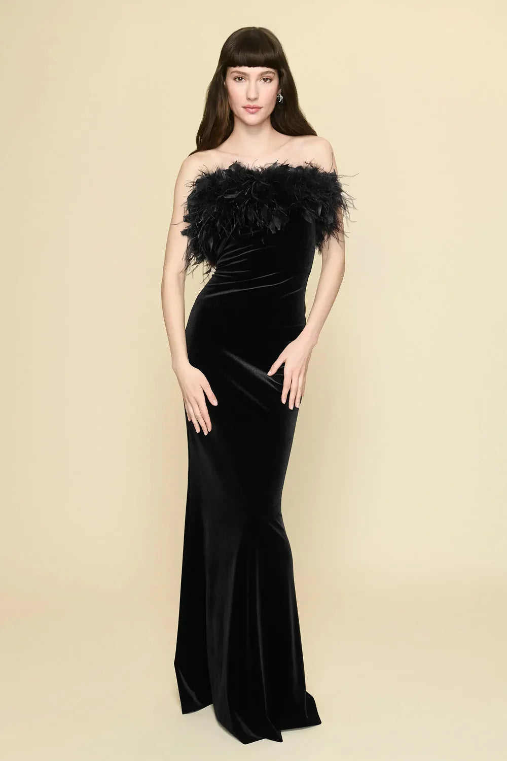 The Amanda Uprichard Ella Gown in black, a rich plush velvet. Strapless and finished with an ostrich feather trim at the neckline. Style No. VE-23164
