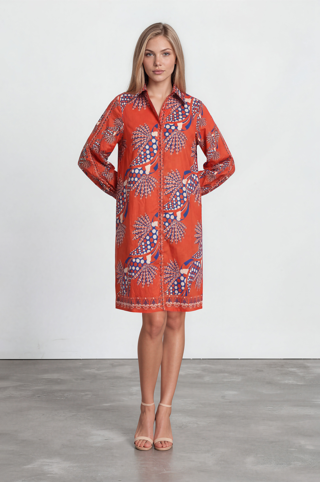 Woman wearing a red patterned dress