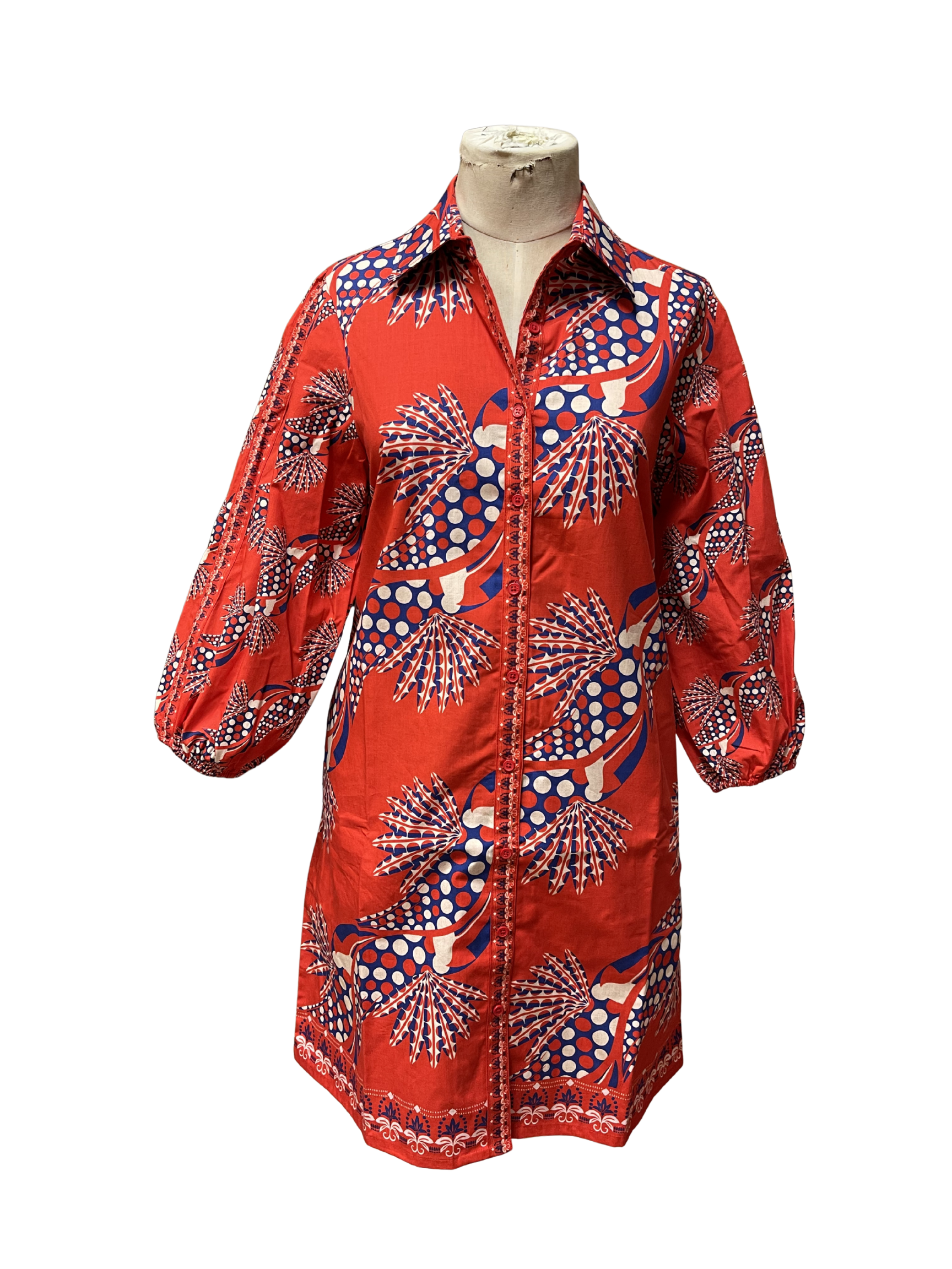 Woman wearing a red patterned dress
