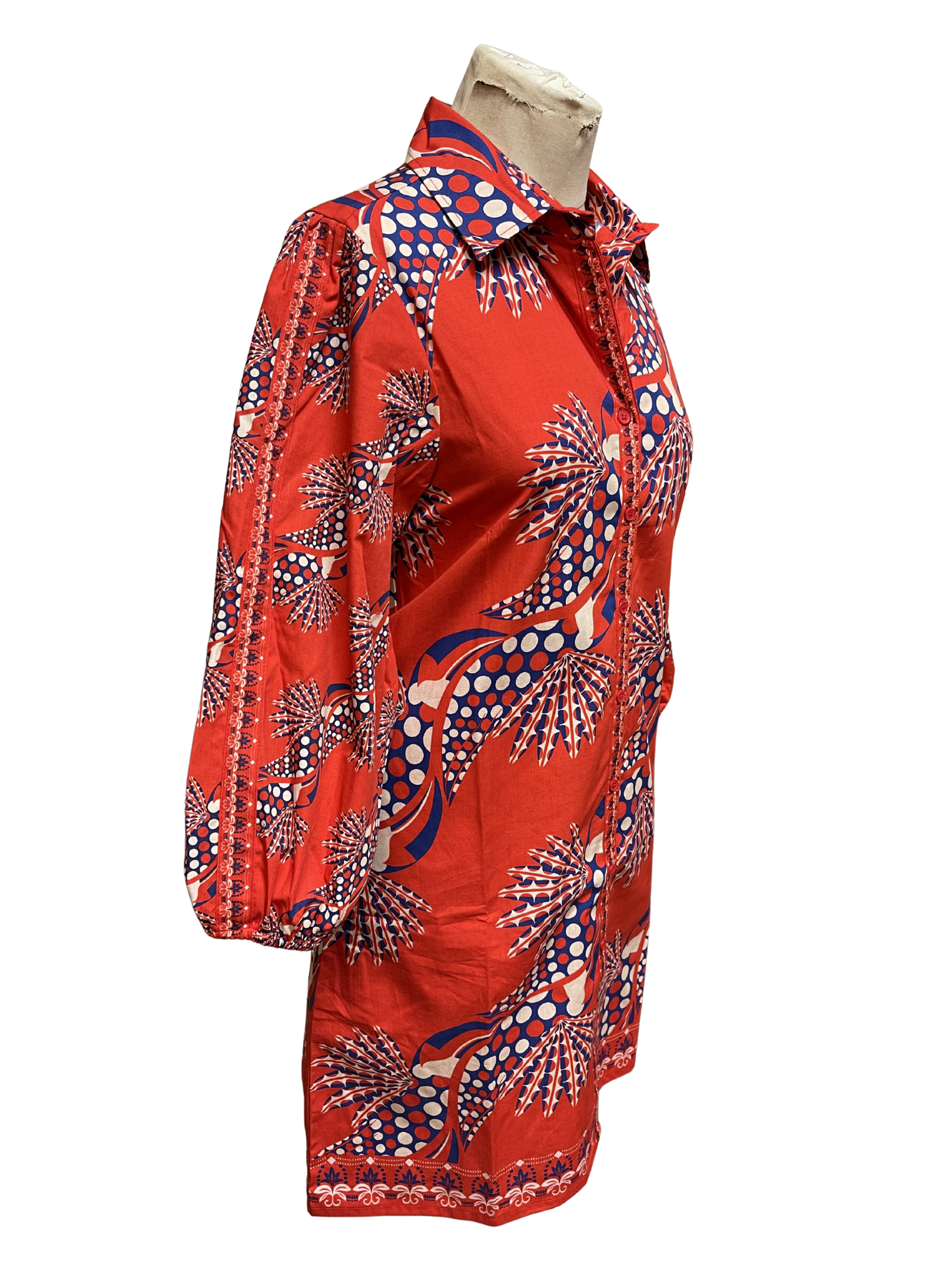 Woman wearing a red patterned dress